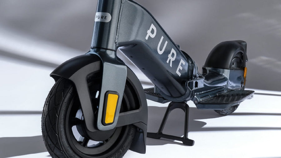 Front wheel and frame of a Pure Advance Flex electric scooter