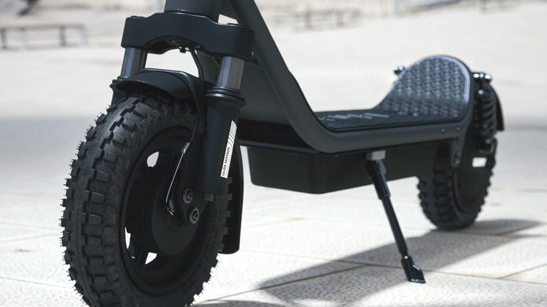 Front tyre and kickstand of a Pure Air⁶ Ultra Suspension electric scooter